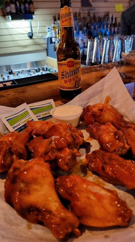 Crispy wings with a cold beer